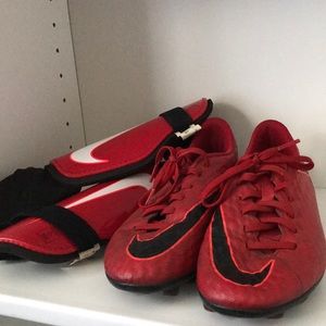 Bundle of Red Nike Soccer Cleats and Shin Guards